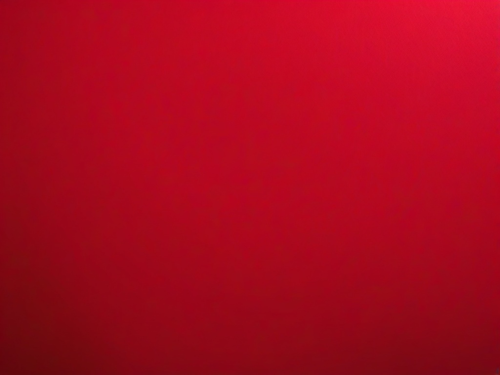 Red Solid Background-Vibrant solid red with a slight matte finish  background wallpaper