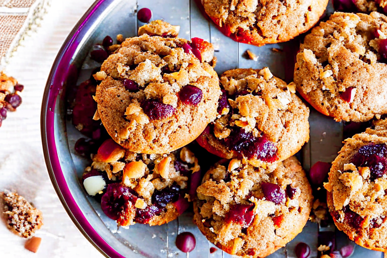 a platter of homemade oatmeal cookies, chewy and studded with raisins and cinnamon. 