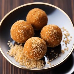 sesame seed balls, deep-fried glutinous rice balls coated with sesame seeds. 