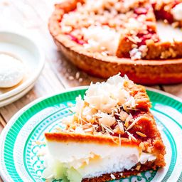 a slice of heavenly coconut cream pie, with a toasted coconut topping and a flaky crust. 