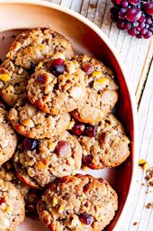 a platter of homemade oatmeal cookies, chewy and studded with raisins and cinnamon. 